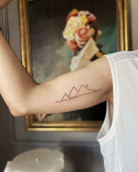 mountain tattoo meaning|mountain minimalist tattoo.